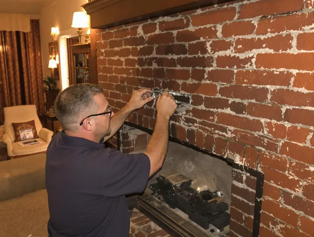 Fountainebleau Chimney Sweep expert fixing a fireplace in Fountainebleau, FL